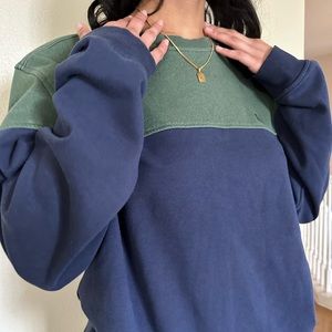 Navy blue and green sweater